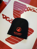 Red Summit Swag, Red Summit Beanie, Red Summit logo in red embroidered on soft knit black beanie. Displayed against Jeep fender decals of American flag.